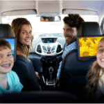 Family in the car with the OMNI in-car entertainment system
